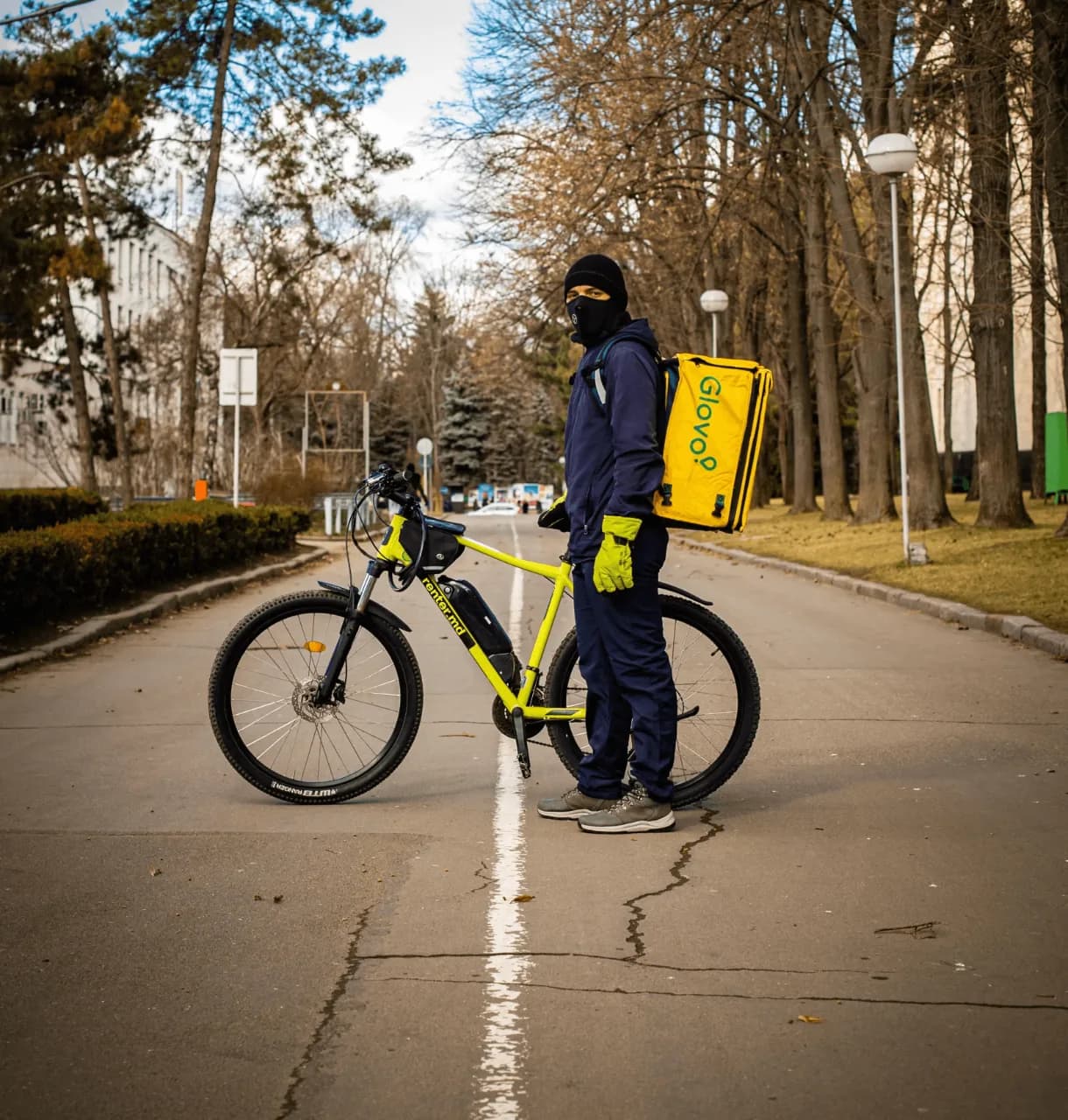 A person on a bicycle on the side of the road